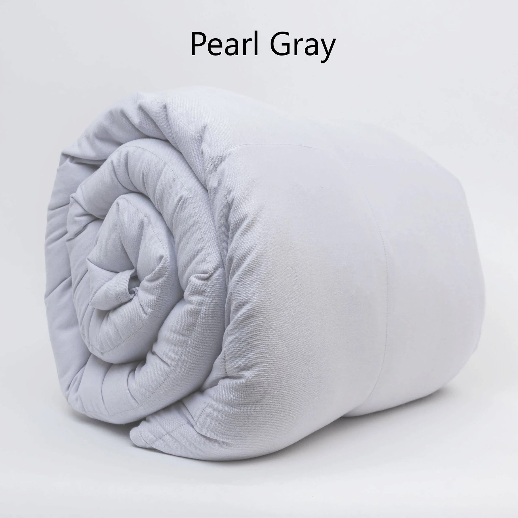 Pearl gray Coolmax Cooling Weighted Blanket rolled to show its quilted construction